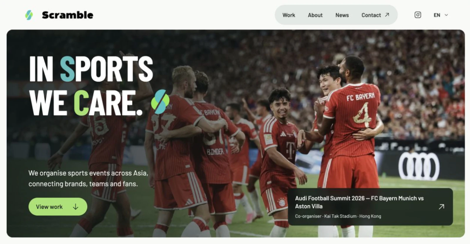 SCRAMBLE homepage featuring a production scene in a stadium
